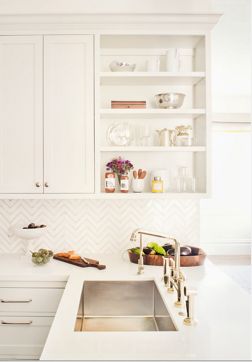 Gorgeous white kitchen with herringbone backsplash 