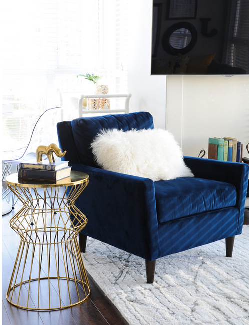 Can't get enough of this navy velvet chair, especially when paired with all this white and gold. 