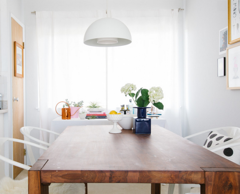 Raw wood table and lovely styling from the apartment tour of Jeanne Chan of Shop Sweet Things