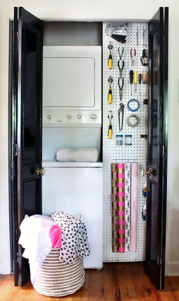 Laundry room with pegboard wall for tools and wrapping supplies. 