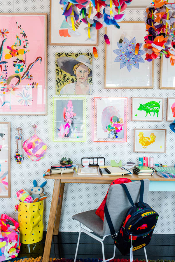 Pegboards are the perfect way to hang art--who knew?!