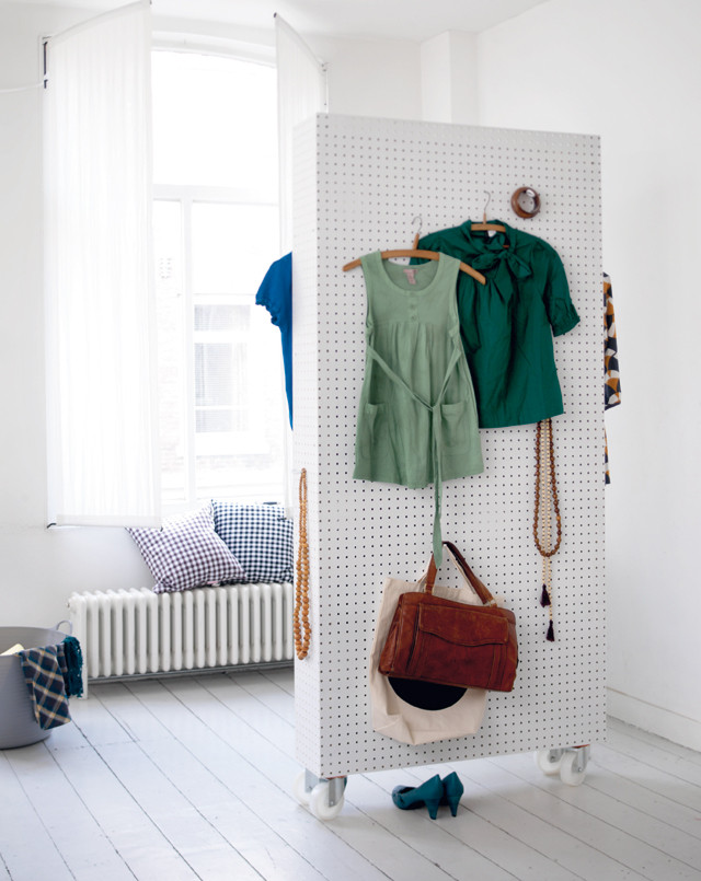 Pegboard room divider/ clothes valet. Such a smart idea! 
