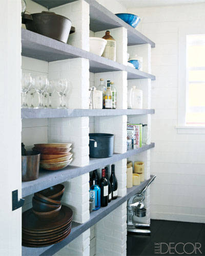 Meg Ryan's stylish storage: Bluestone shelves and painted-brick supports create storage in the pantry.