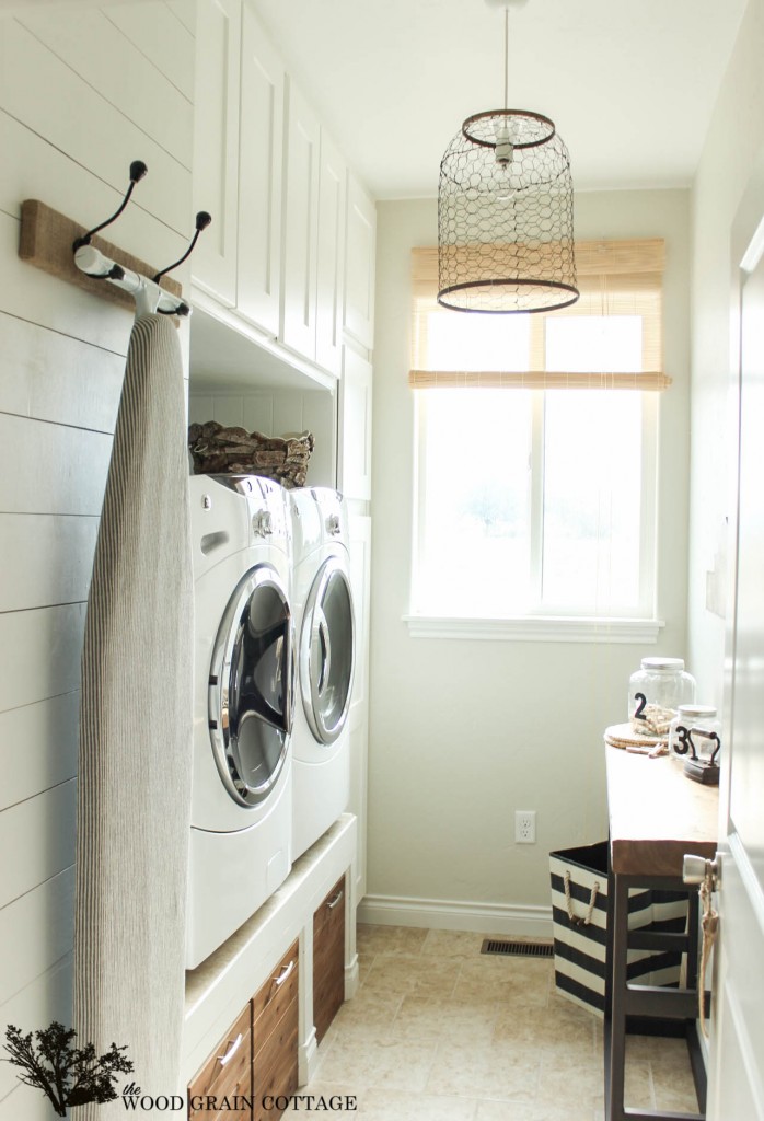 the ideal laundry room definitely has a pedestal washer/dryer. More storage space and less bending over? Sign me up!