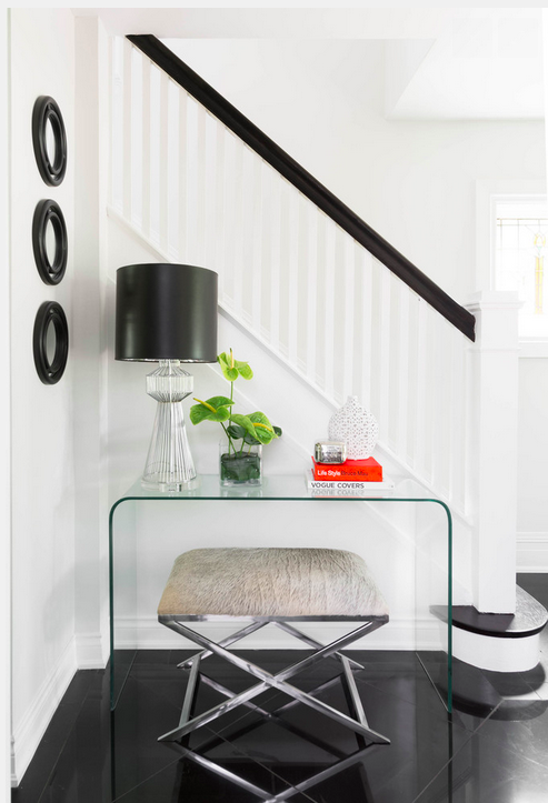 classic entryway with lucite console table.