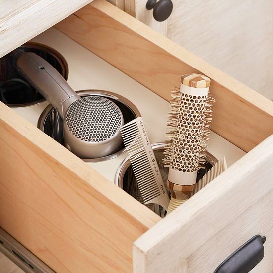 Adding this to my dream-home wish list: built-in storage for hot hair styling tools. So genius. 
