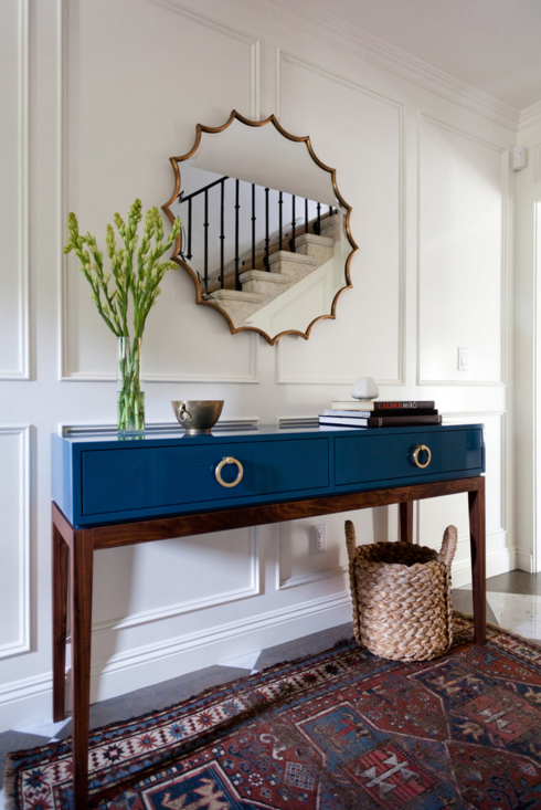 Spotlight on Taylor Jacobson Interior Design--an entry with blue lacquer console table.