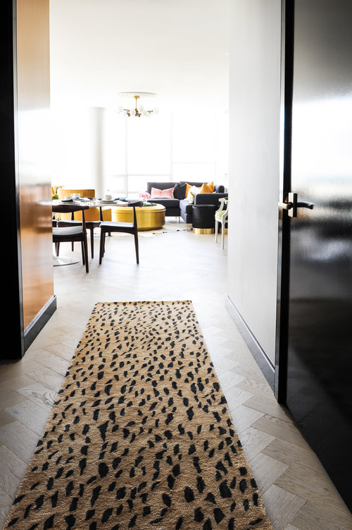 Retro gets reimagined in this crazy stylish home. Case in point: the leopard (-ish) print runner. 