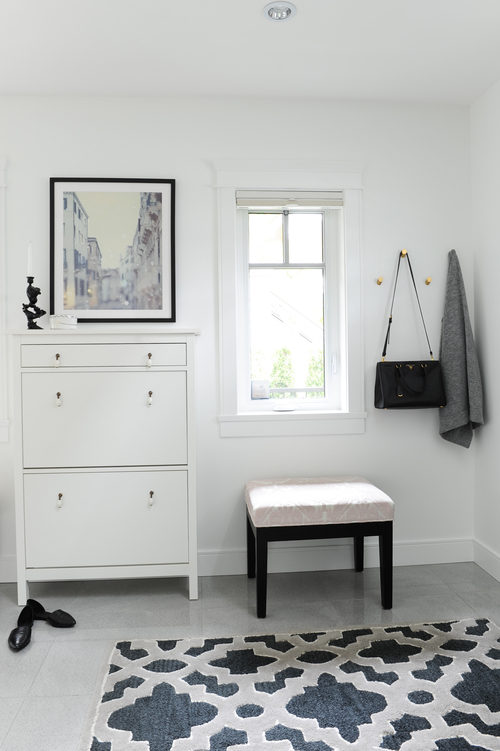 A small, efficient entryway (looking at you, shoe cabinet) that still manages to have Parisian charm. 