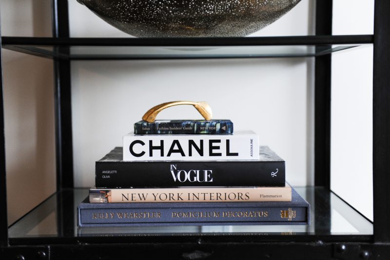 Studying Chrissy & Co's design vignettes. A chic stack of a books and a brass design object is all you need. 