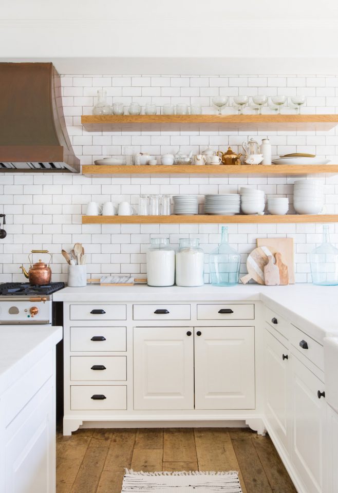 Open shelves, subway tiles, and a statement-making copper hood make Lauren Conrad's kitchen feel both clean and warm. 