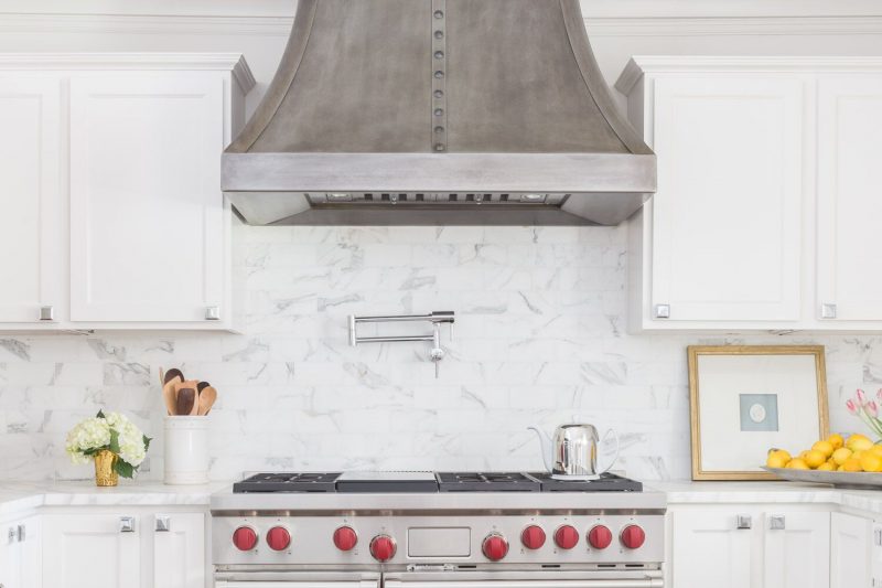 Gorgeous white kitchen with marble subway tiles by Austin Bean Design Studio, photographed by Alyssa Rosenheck