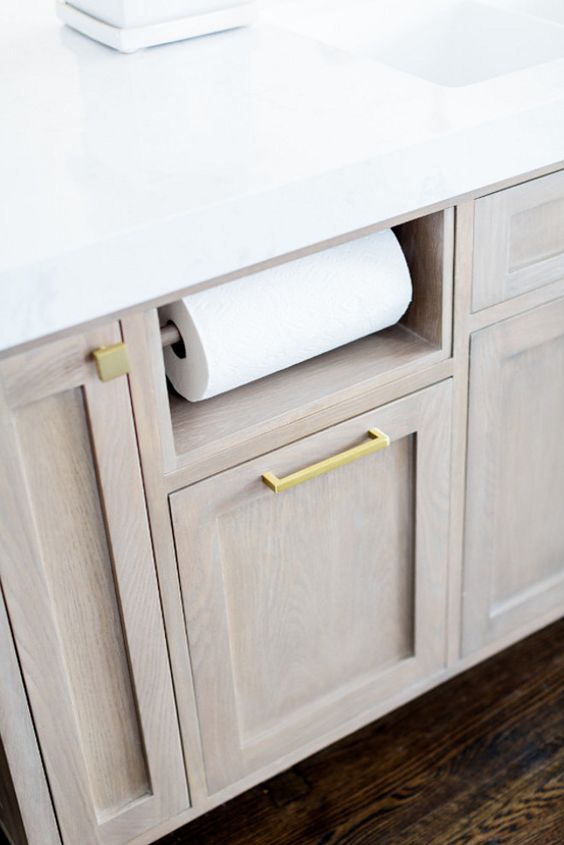 Designing an ideal kitchen? Here's a better way to keep paper towels handy.