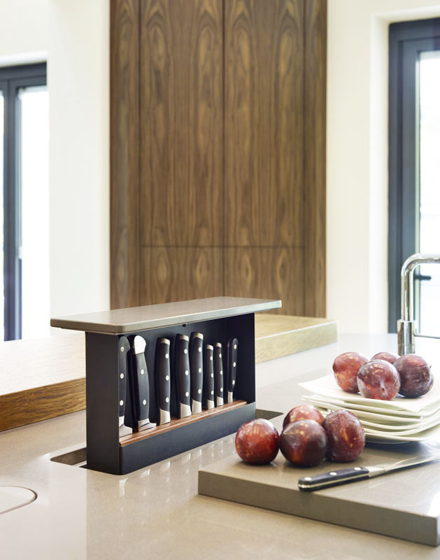 Uber clever, customized knife storage. File under "Dream Kitchen" features. 