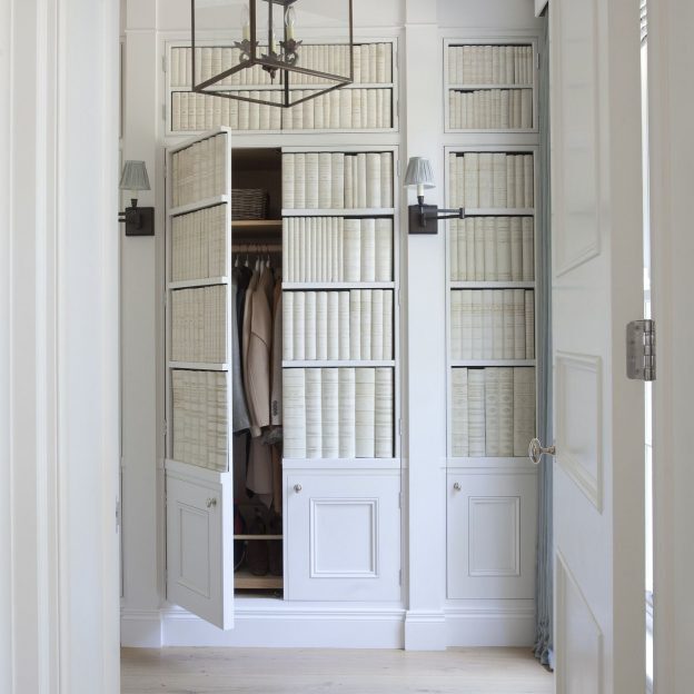 closet-hidden-doors-concealed-storage-and-coat-space-from-this-coastal-style-roomy-18f-624x913